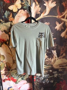 Comfort Colors size M peeking raccoon pocket tee